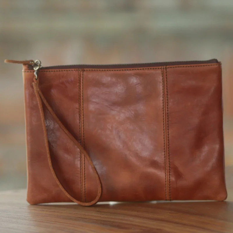 - Pet stroller can be taken on the planeChestnut Tranquility Brown Leather Wristlet