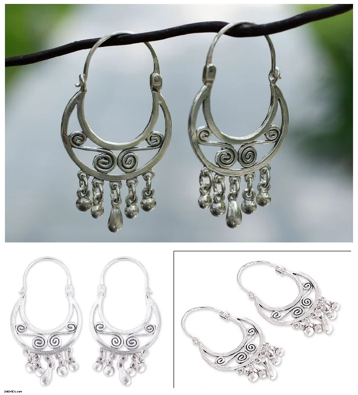 - Teething and chewing toys for puppiesTaxco Dancer Silver Hoop Earrings