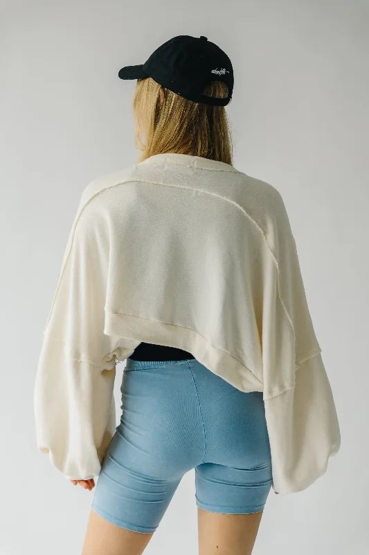 The Teerlink Lantern Sleeve Crop Cardigan in Ivory